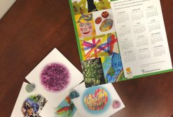 2019 Sistering Program calendar and sistering cards placed on a table